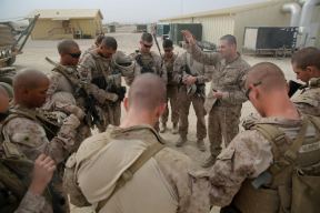 Navy Lt. Andrew Brod, chaplain, 1st Battalion, 7th Marine Regiment, says a prayer before Marines with Weapons Company conduct a partnered Mission Rehearsal Exercise at Forward Operating Base Juno, Afghanistan, March 13, 2014. The Marines traveled to Forward Operating Base Juno 17 kilometers away and provided security on three objectives while Afghan National Security Forces cleared the area of notional hostile threats. The MRX was a training mission to help prepare the infantrymen for potential future operations.
